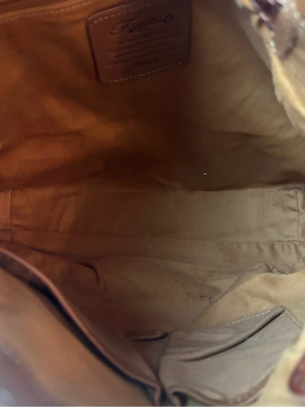 Fossil tooled leather